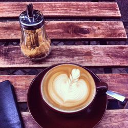 Close-up of cappuccino on table