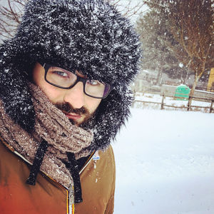 Portrait of smiling woman in snow