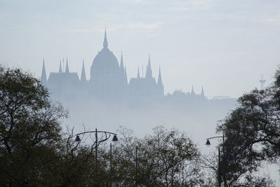 The hungarian parliament building in fog