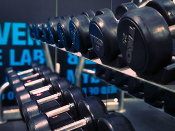 Close-up of dumbbells at gym