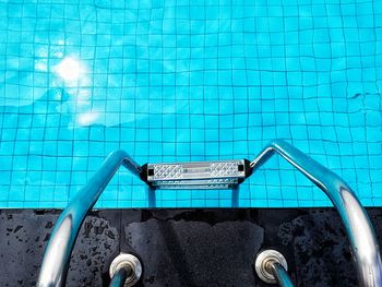Swimming pool against blue wall