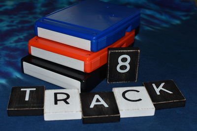 Close-up of 8-tracks with text