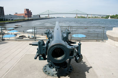 Coin-operated binoculars against sky