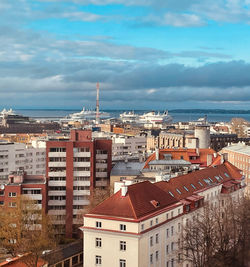 High angle view of buildings in city against sky