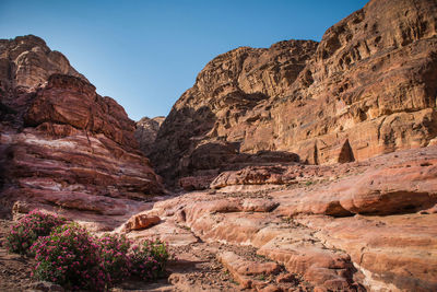 Scenic view of rock formations against clear sky