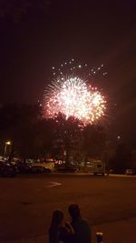 Firework display at night