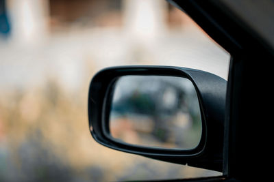 Close-up of side-view mirror