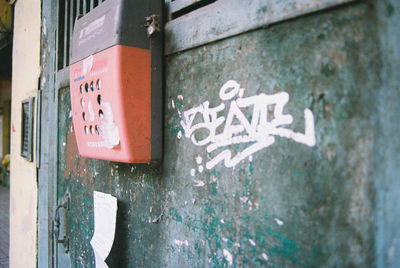 Close-up of text on wall
