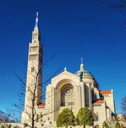 Low angle view of cathedral against blue sky