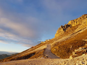 Rock formations on landscape against sky in the dolomites