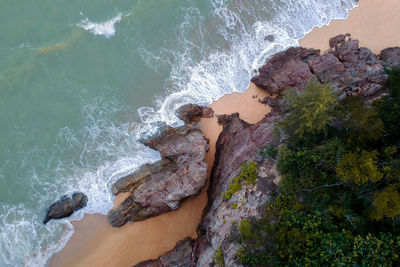 High angle view of rock formation at sea shore