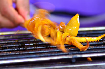 Close-up of person preparing food