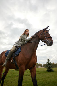 Horse standing on field