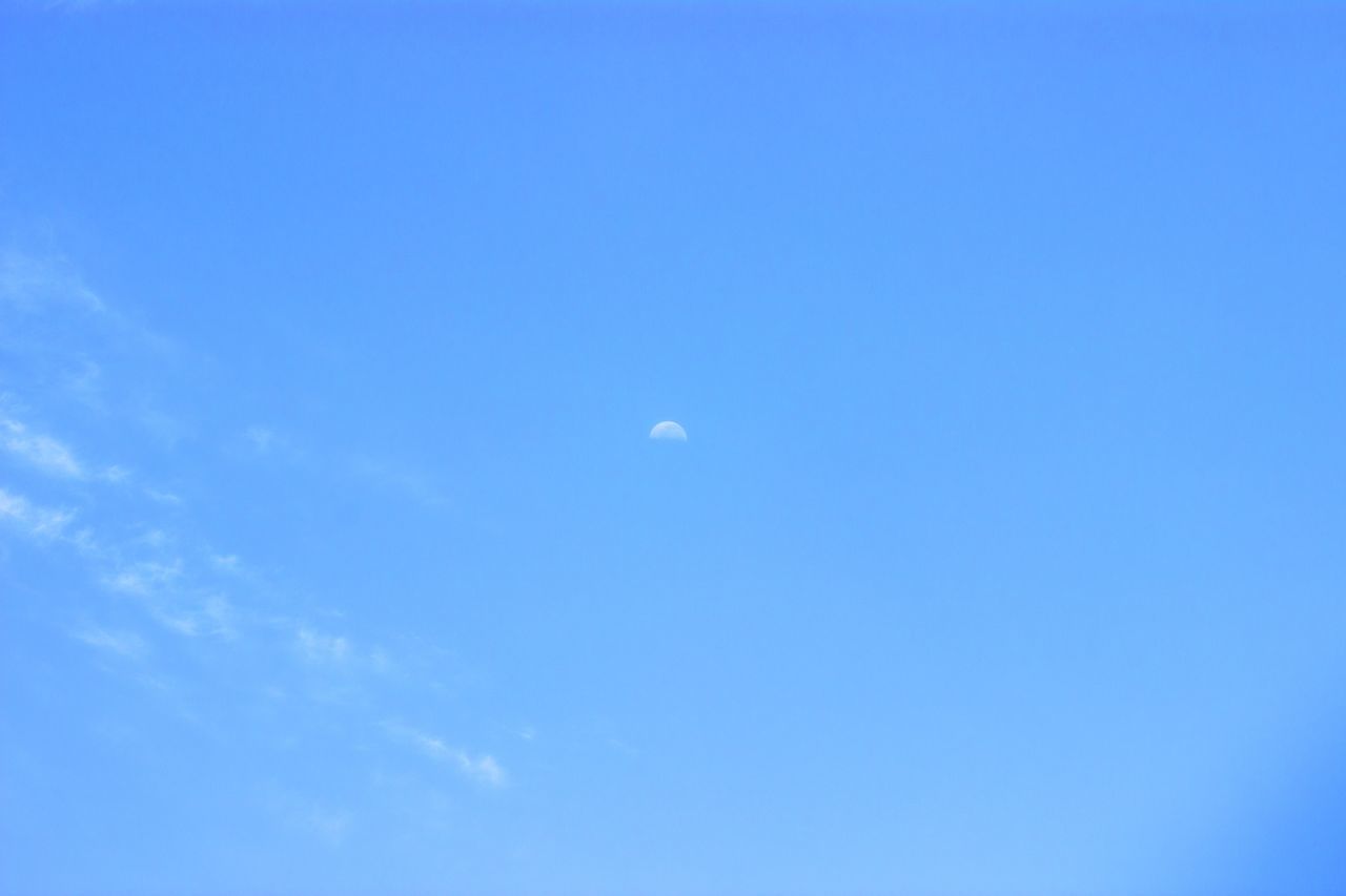 sky, blue, moon, cloud, nature, beauty in nature, no people, tranquility, low angle view, space, copy space, scenics - nature, tranquil scene, clear sky, outdoors, idyllic, backgrounds, astronomical object, day, flying, astronomy