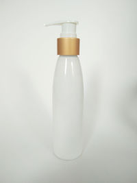 Close-up of bottle against white background
