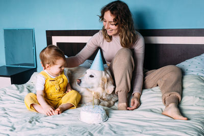 Women sitting on bed