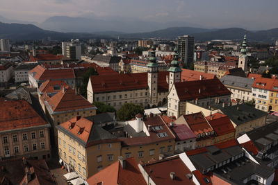 Aerial view of town against sky
