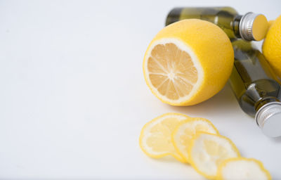 Close-up of oranges against white background