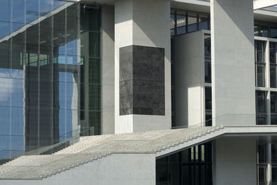 Reflection of building on glass window