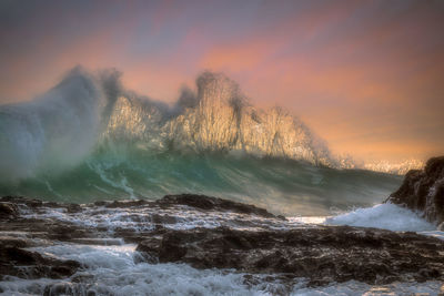 Scenic view of sea against sky during sunset
