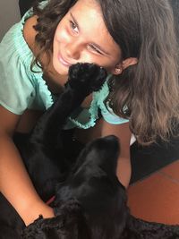 Portrait of woman with dog