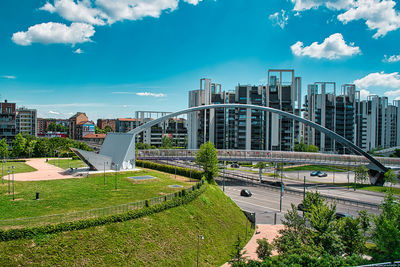 Modern buildings against sky in city