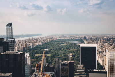 High angle view of central park buildings in city against sky