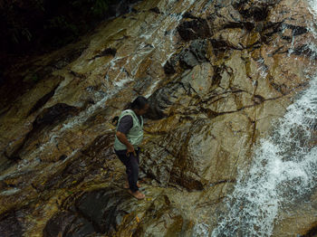 Man standing on rock