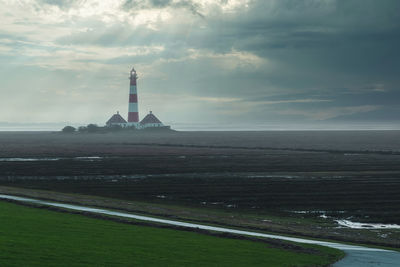 Westerheversand lighthouse on the north sea a landmark of the eiderstedt peninsula in germany.