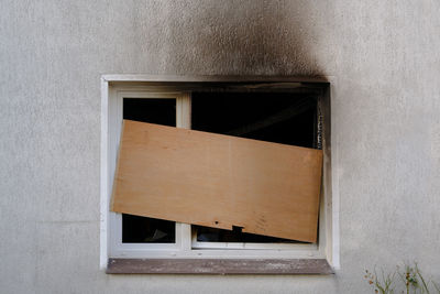 Close-up of window on wall of building