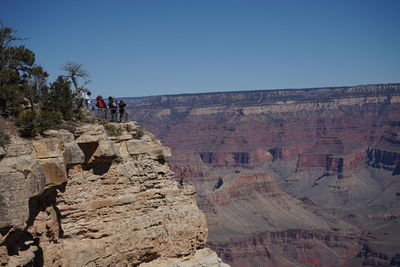 People walking on rocks