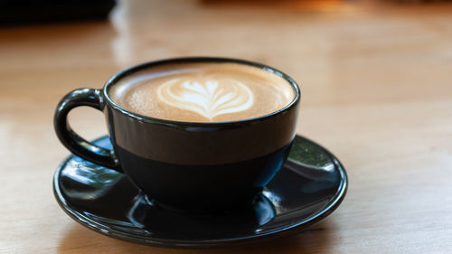 Close-up of coffee on table