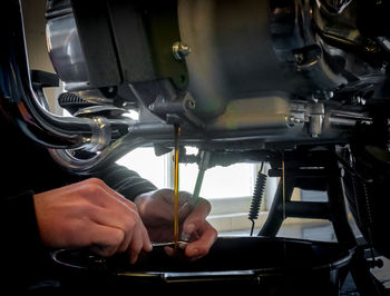 Close-up of hand holding machine