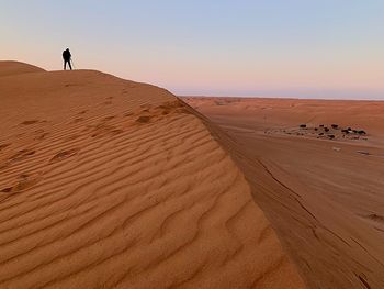 Scenic view of desert against sky