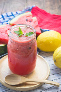 Close-up of fruits in glass on table