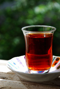 Close-up of tea in glass on table