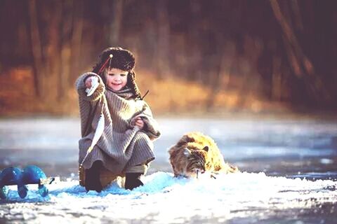 snow, winter, cold temperature, season, weather, leisure activity, animal themes, lifestyles, covering, warm clothing, full length, looking at camera, portrait, focus on foreground, frozen, front view, sitting, standing