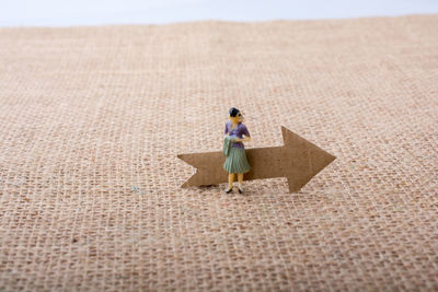 High angle view of woman standing on street