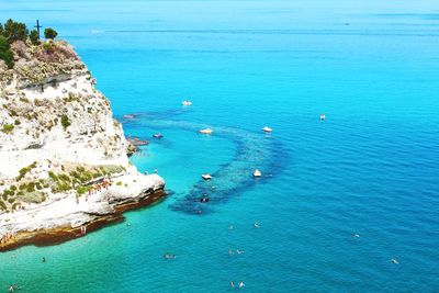 High angle view of sea and rocks