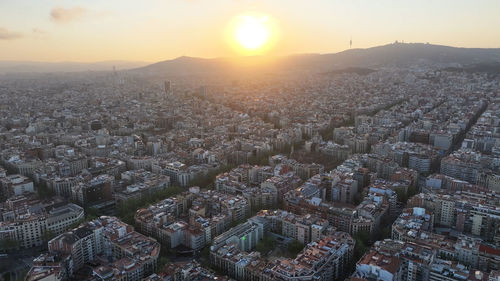 High angle view of townscape against sky during sunset