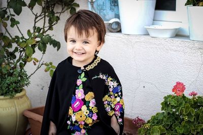 Portrait of a girl holding flower