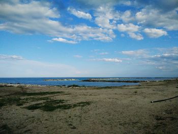 Scenic view of beach against sky