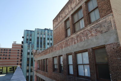 Low angle view of residential buildings against sky