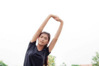 Close-up of woman exercising outdoors