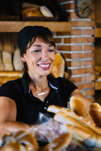 Young woman working at bakery