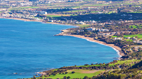 High angle view of sea and townscape