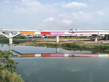 View of bridge over water against sky