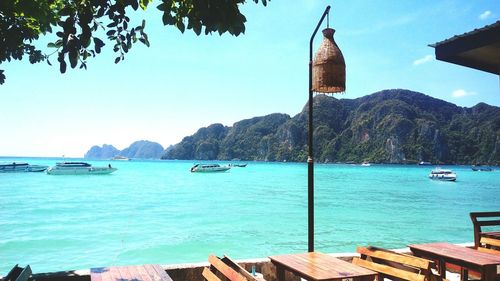 Scenic view of sea against clear blue sky