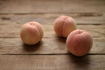 Close-up of apples on table
