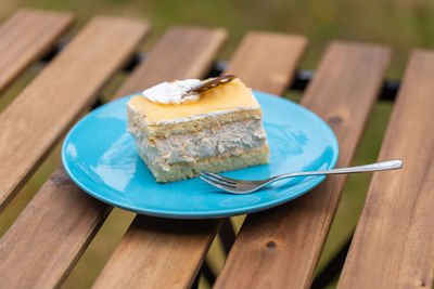 Close-up of cake slice in plate on table